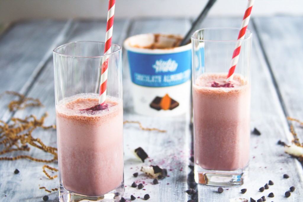 This Almond Joy smoothie recipe is vegan, gluten free, and tastes just like an Almond Joy candy bar, only it's better for you. An ice cream smoothie with vegan chocolate almond ice cream, strawberries, and coconut. The perfect healthy substitute for a milkshake, too!