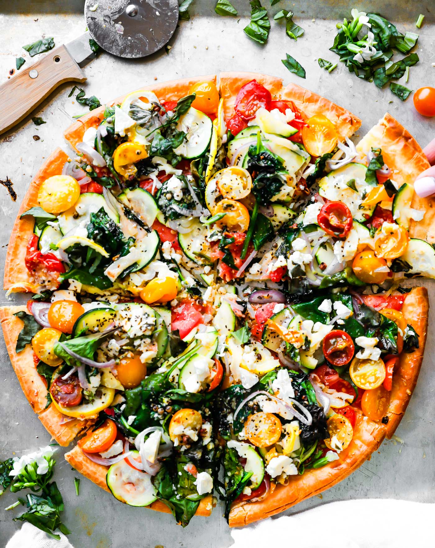 Overhead view of a gluten-free flatbread pizza.