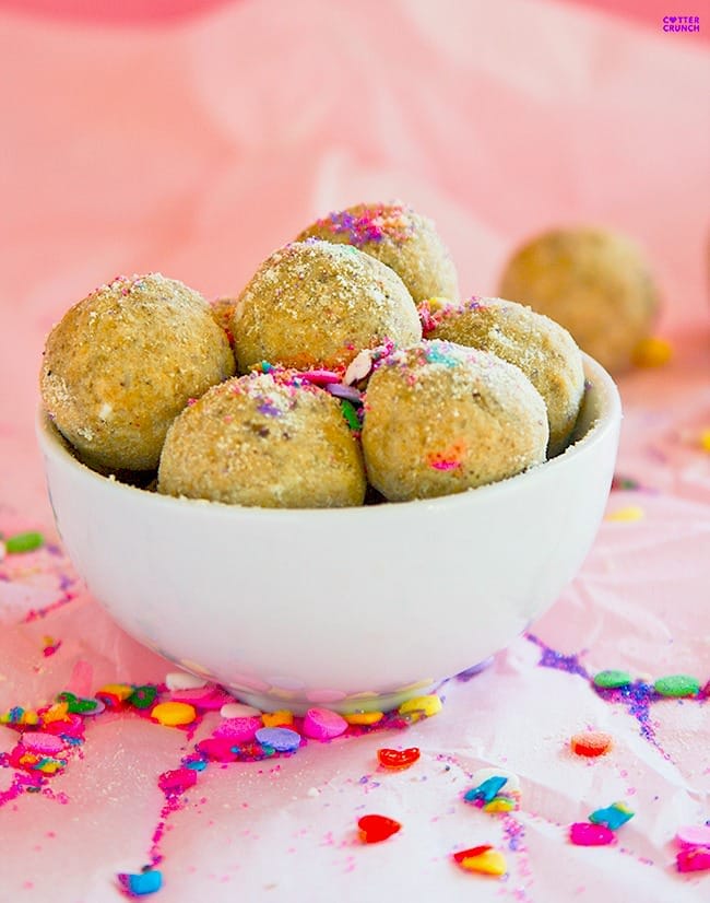 Easy no bake protein rich snack bites that are bursting with flavor and grain free. These are such a treat for Spring! Packed with healthy fats and protein, these are perfect for after workout or school snacks! You could use peanut butter, almond butter, or even sunflower butter.
