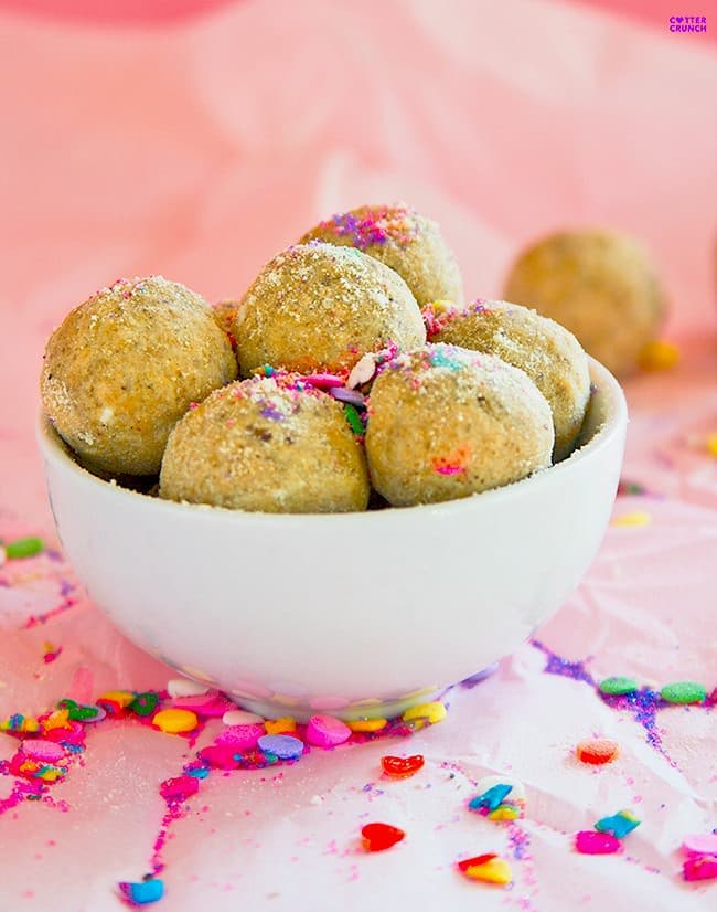 Easy, no-bake, protein-rich, Lemon Vanilla Sprinkle Gluten Free Cake Bites bites that are bursting with flavor. Perfect treats or healthy snacks!