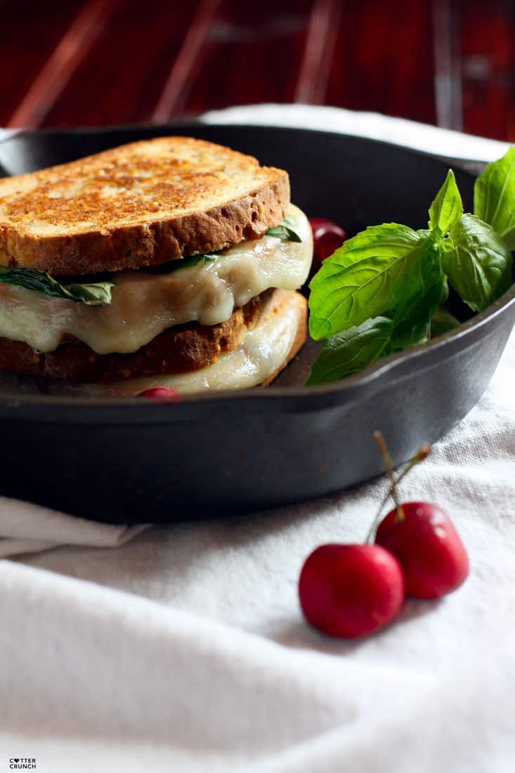 Gluten Free Grilled Cheese with fresh cherries, basil, and provolone cheese. A healthy "gourmet" recovery meal with good carbs, protein, fats and anti-inflammatory rich nutrients. A fun twist on the original grilled cheese sandwich that your whole family will love, kids included!