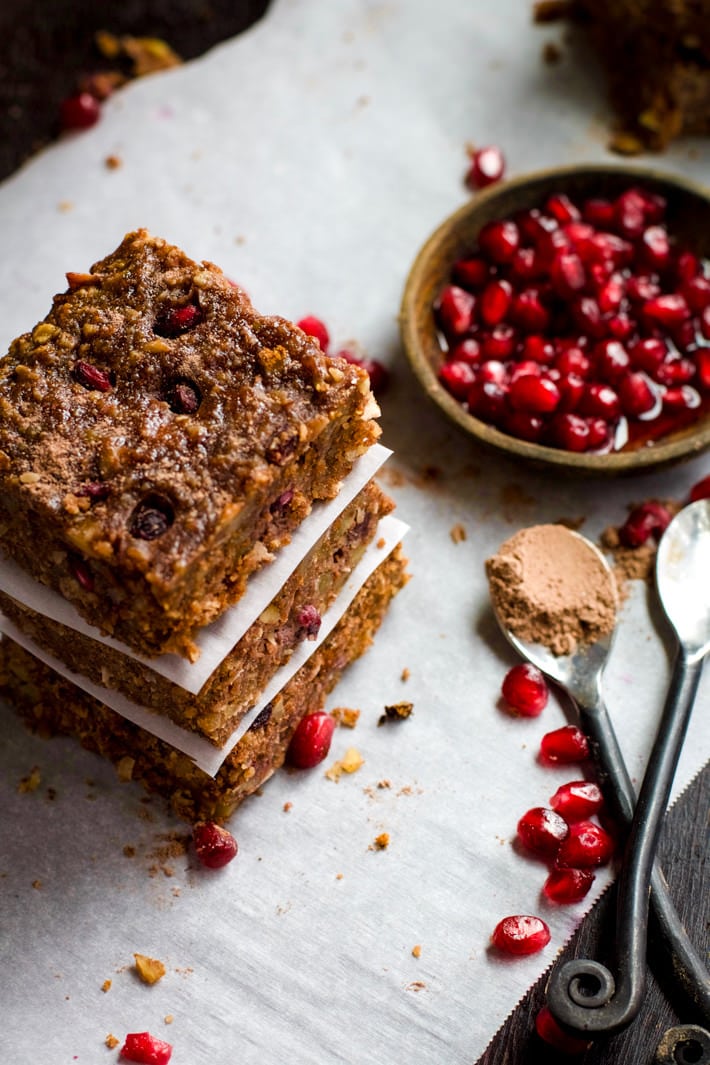 Gluten Free Chocolate Almond Bars with Pomegranate! Oh heavens yes! A Vegan friendly and Gluten Free Chocolate Bar you can have for breakfast, snack, or dessert! Packed with Antioxidants (cocoa, almonds, pomegranate) and bursting with flavor. Healthy yet satisfying