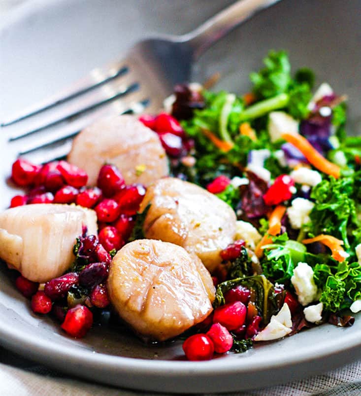 EASY Maple Balsamic-Glazed Scallop with Pomegranates Recipe! All you need is one pan, 10 minutes, and less than 6 ingredients. Healthy Maple Balsamic-Glazed Scallops and tangy sauce is so perfect for a date night in or to impress anyone really. Paleo friendly!
