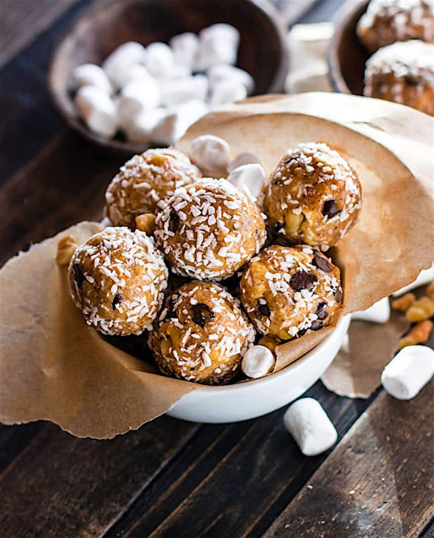 Gluten Free Coconut Rocky Road Peanut Butter Bites. Super simple no bake peanut butter bites that are packed with a rocky road and coconut filling! Made with natural ingredients that are dairy free, grain free, and healthy! Great for kids, snacking, and real food fuel for all.