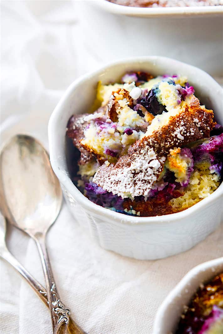 Easy Paleo Blueberry coconut soufflé bake. Rich and creamy yet also airy and lightly sweet! This paleo blueberry coconut soufflé bake is a twist on the classic French dish. Feeds many, easy to make, simple ingredients, and so delicious! great for brunch or dessert!