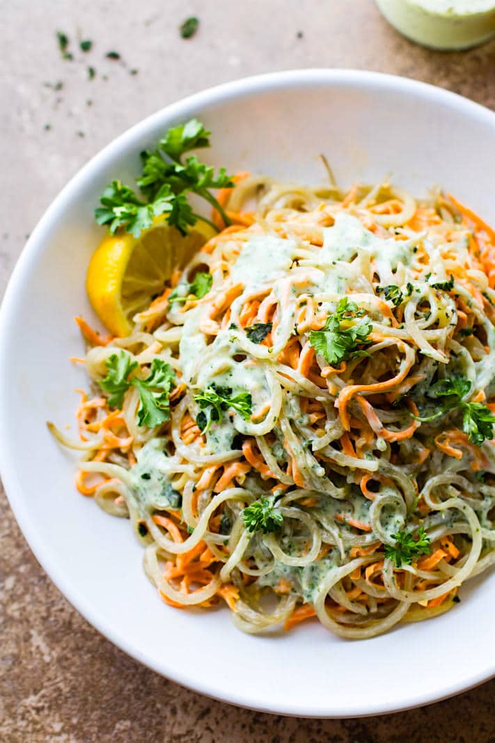Easy Green Goddess spiralized Potato Salad! A paleo and vegan pasta style potato salad that's so flavorful and healthy! A perfectly creamy potluck side dish. Or grab a spoon and hog this salad all for yourself!