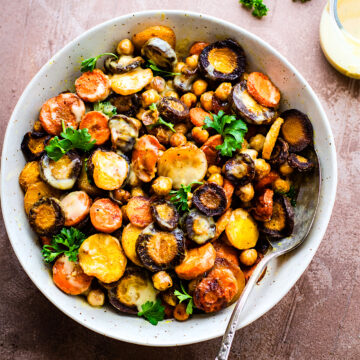 Carrot salad with tumeric roasted chickpeas and tangy apple cider tahini dressing