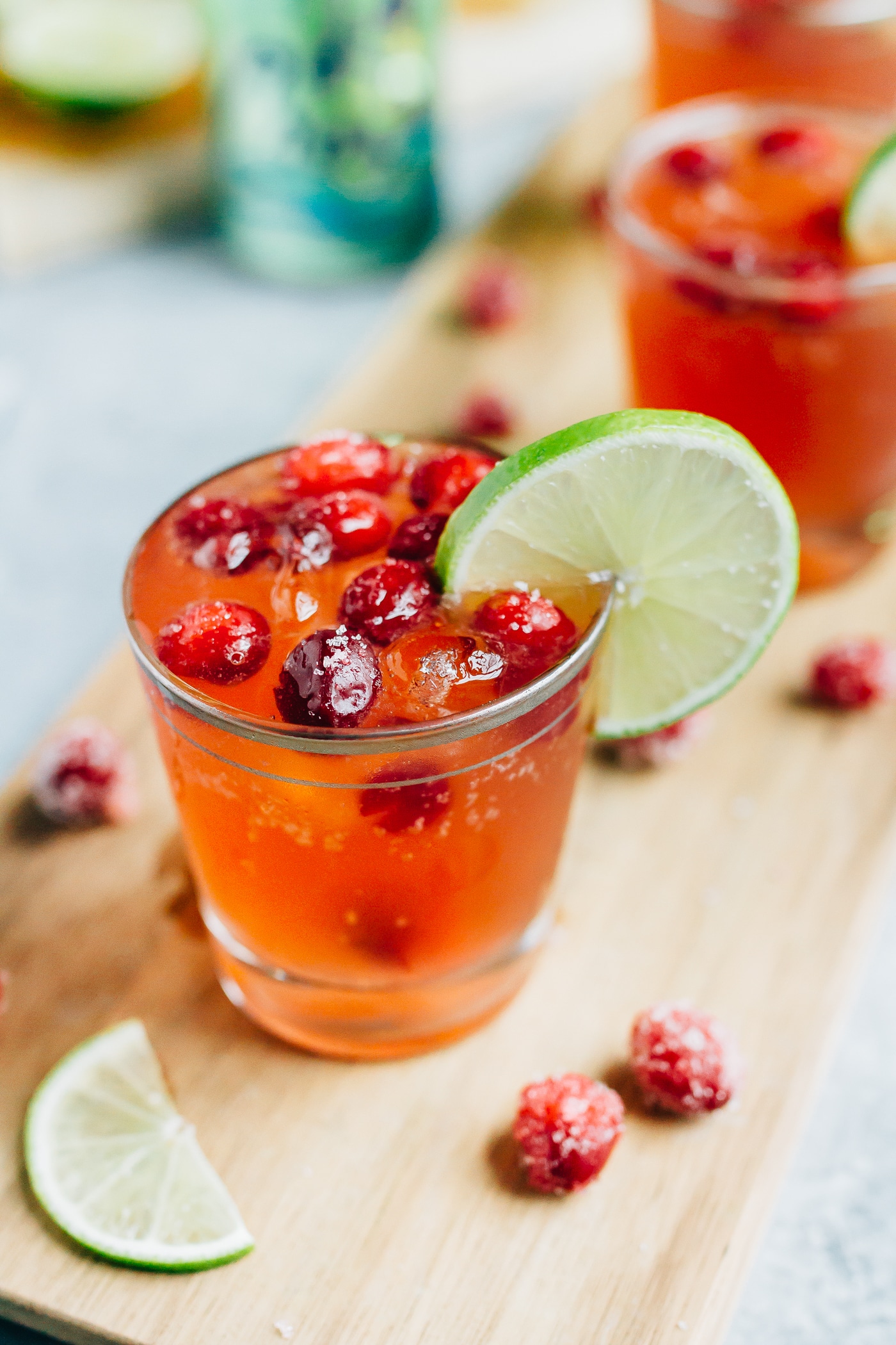 cranberry-pineapple drink on wood plank