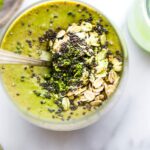 overhead image of an overnight chia matcha smoothie with a spoon in it