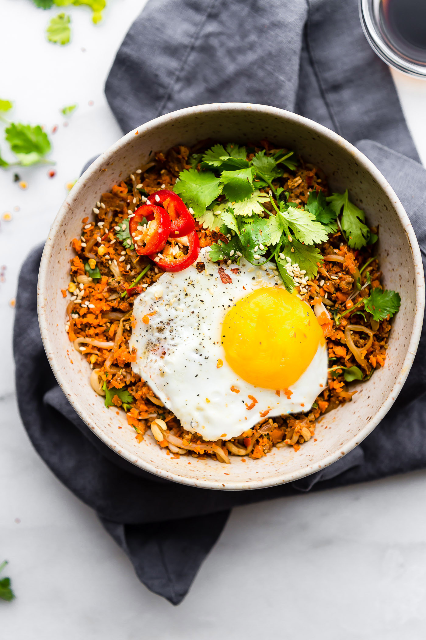 spicy Nasi Goreng breakfast with fried eggs and sausage