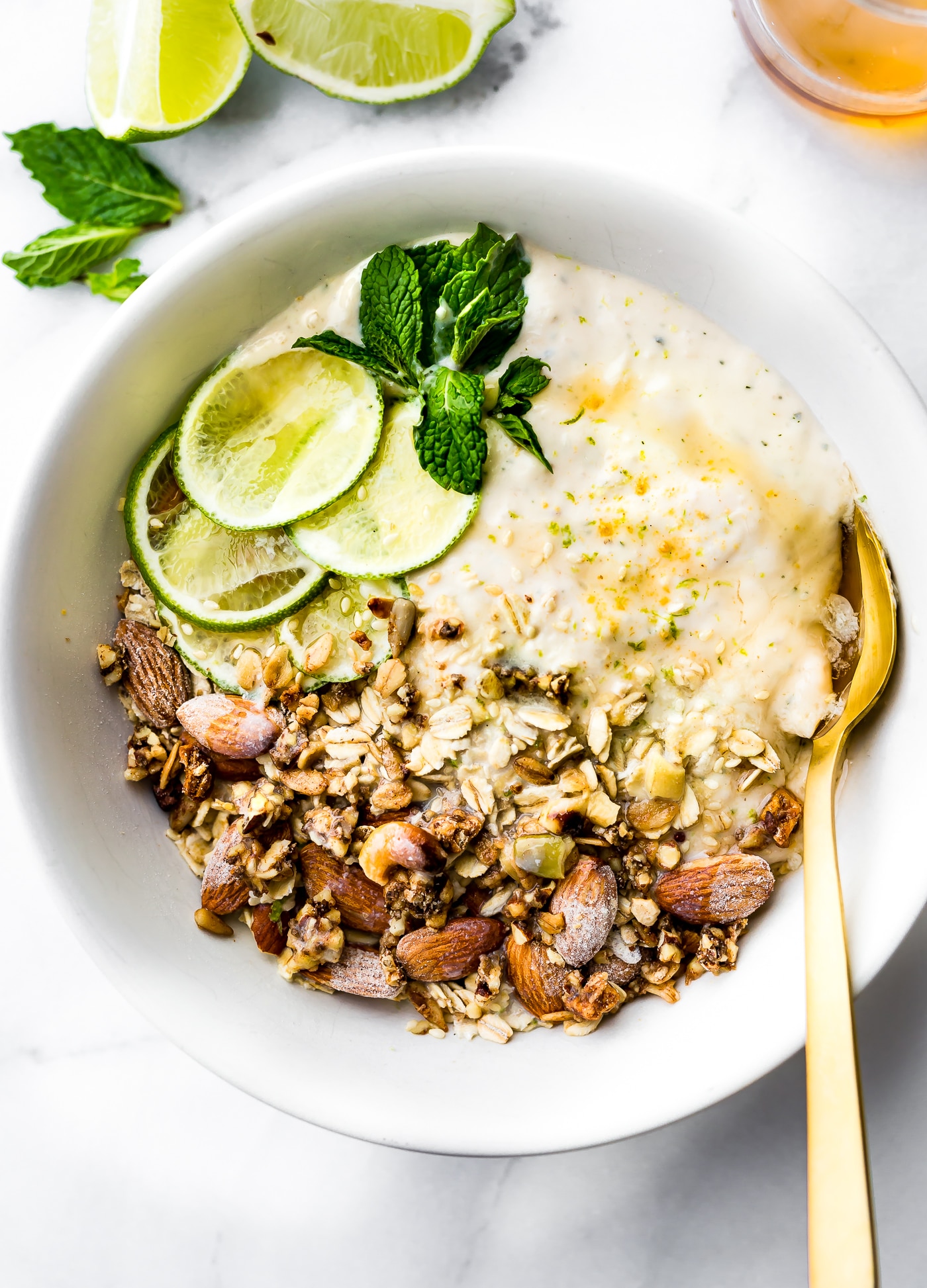 This Zesty Tropical Yogurt Overnight Muesli recipe is the perfect make ahead breakfast bowl! Gluten- free, nutrient rich, and made with Icelandic-style skyr coconut yogurt for a protein boost! www.cottercrunch.com