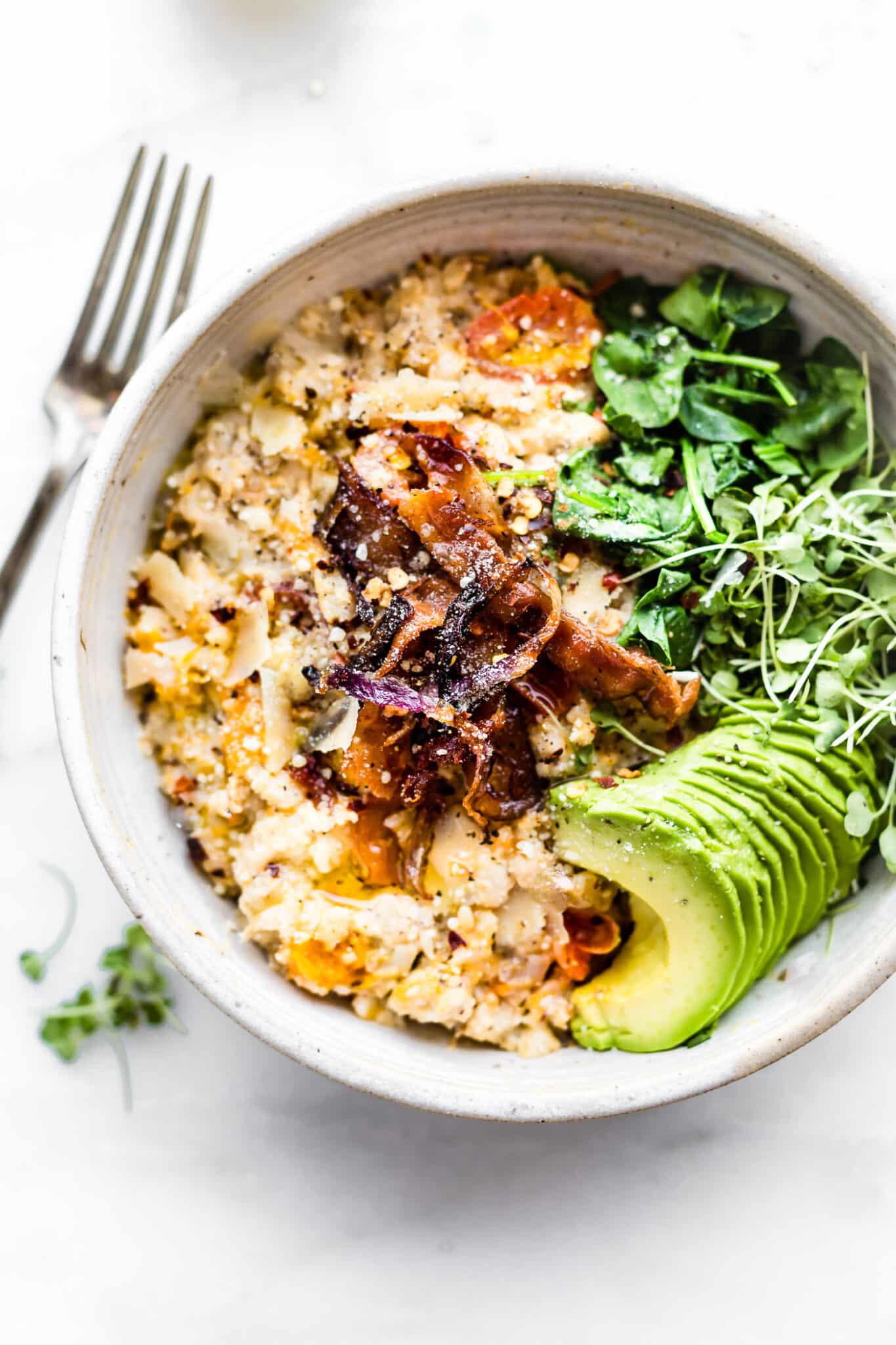 bowl of Savory Slow Cooker Oatmeal topped with crispy bacon