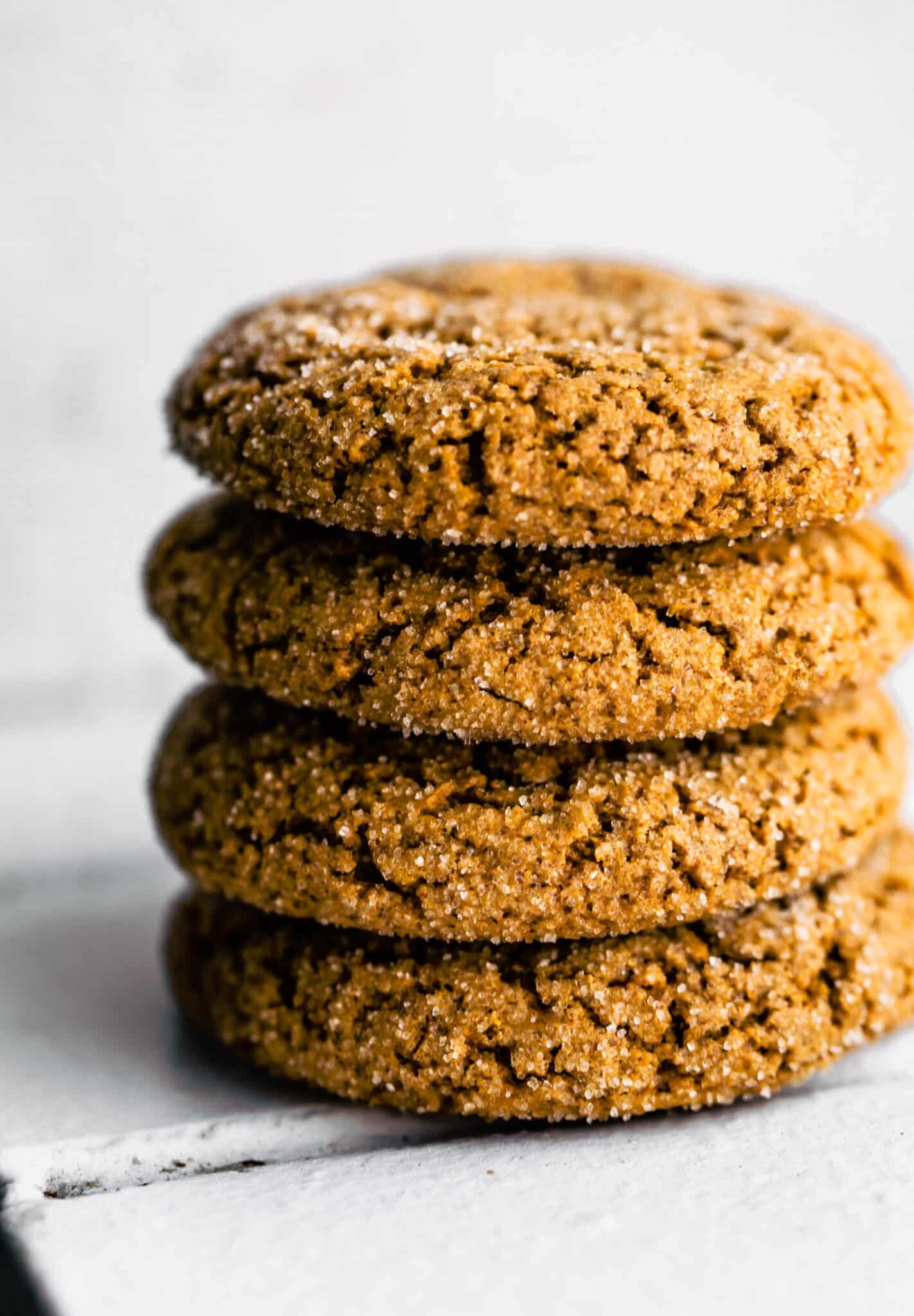 stacked photo of gluten free molasses cookies on white wall