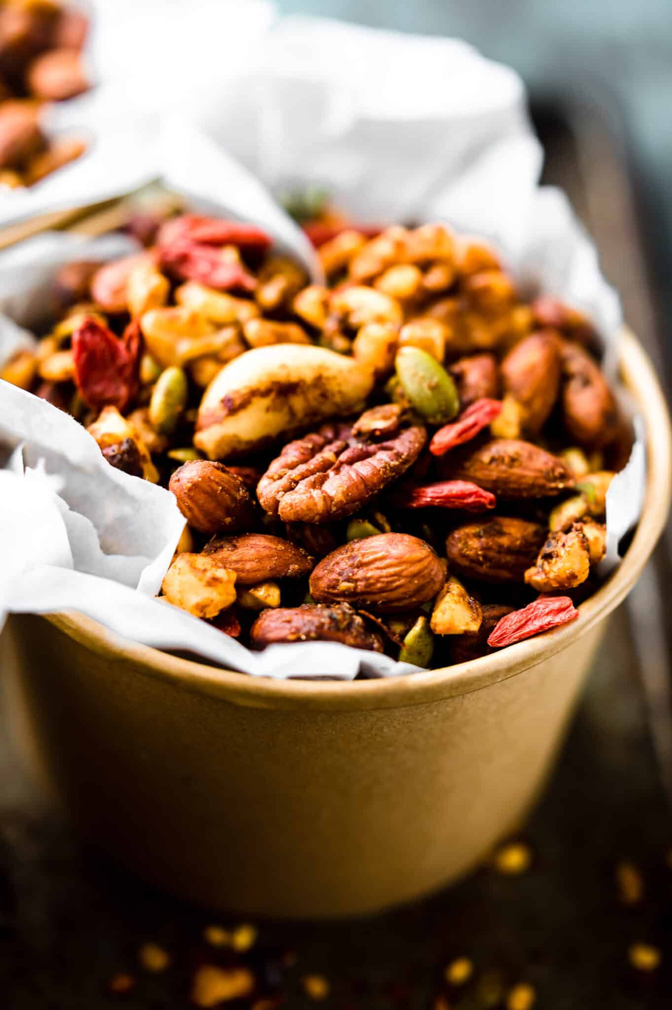 Close up view Thai Curry Spiced Slow Cooker snack mix in cup