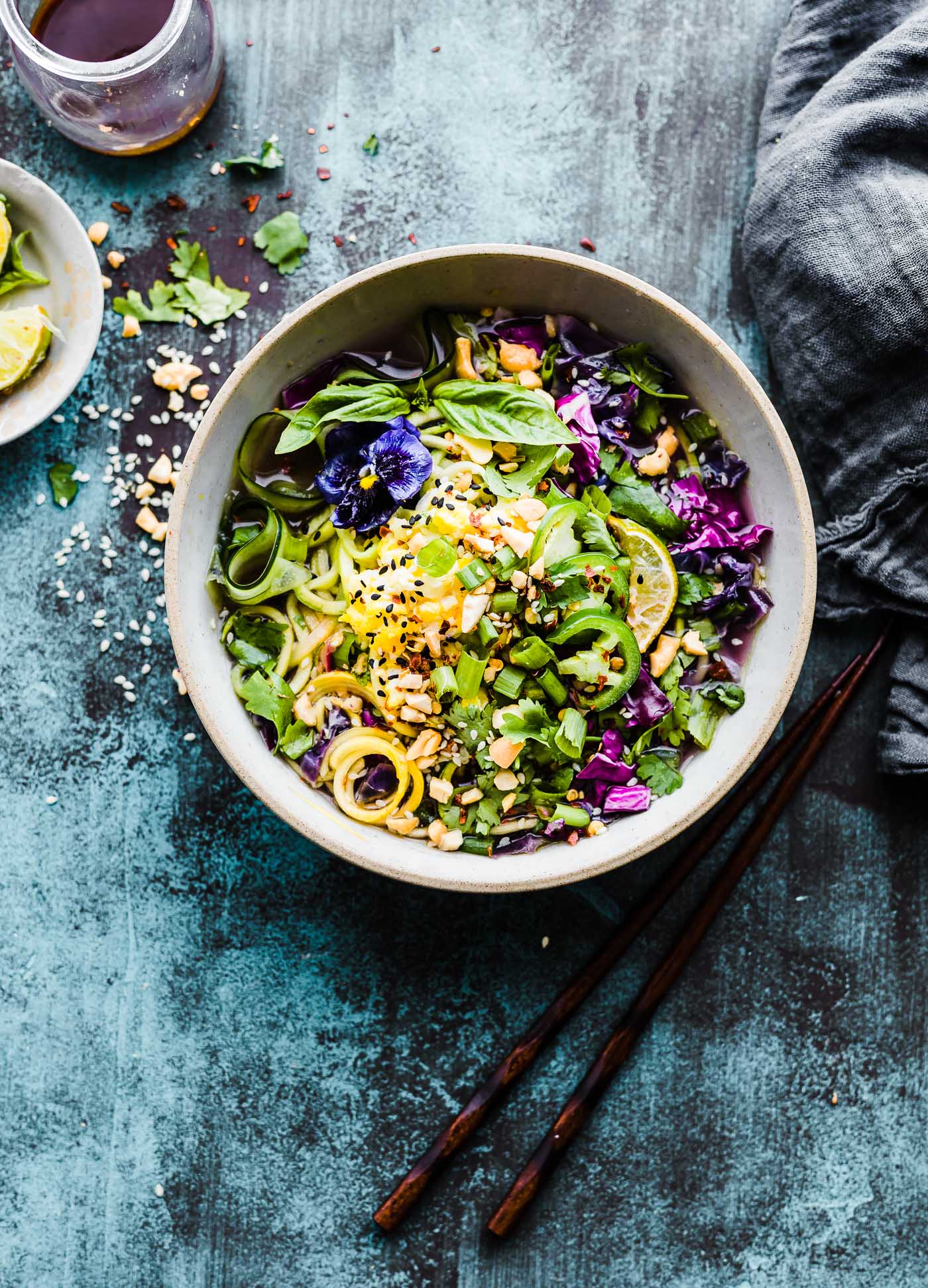 Asian-Inspired Zoodle Flu Buster Soup in stone bowl with chopsticks