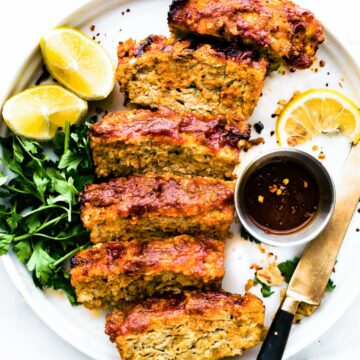 slices of barbecue gluten free meatloaf on a dinner plate