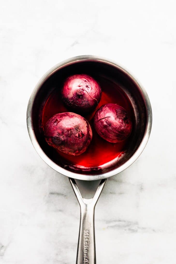 3 steamed beets in a pot