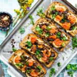 vegan breakfast toast with tomato and hummus