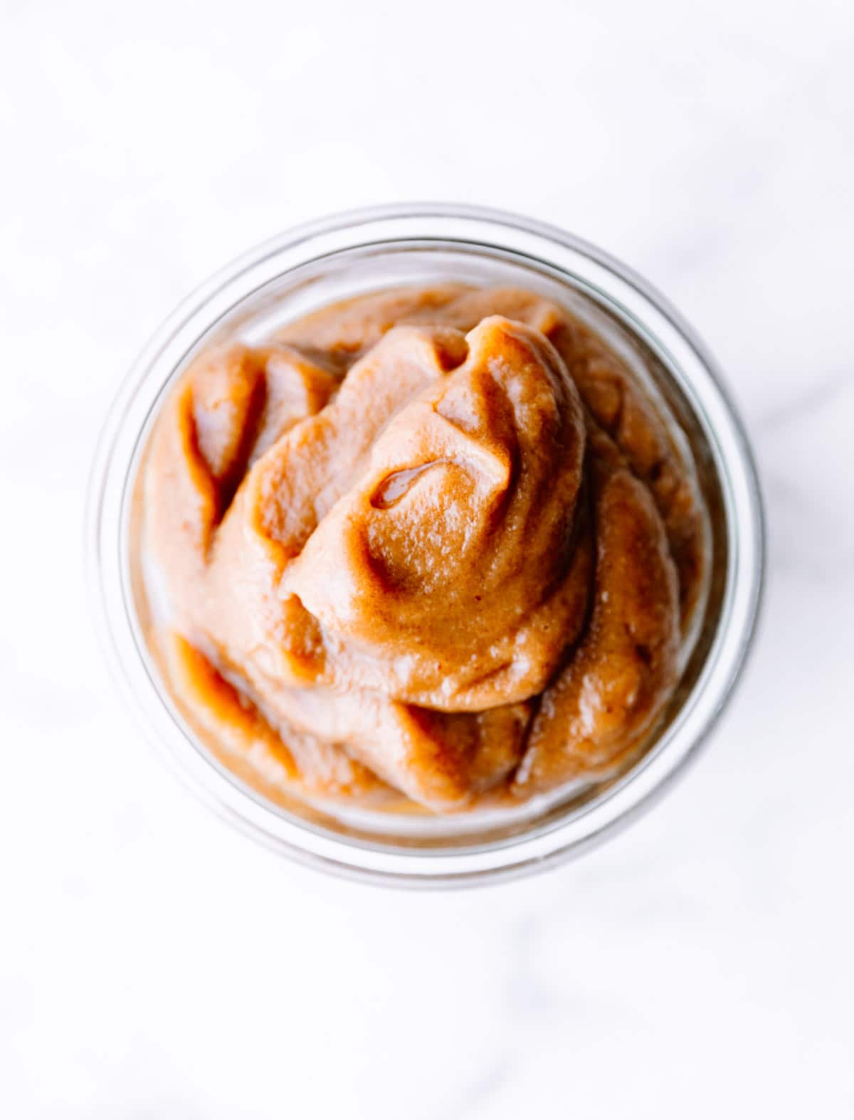 overhead photo of date paste in mason jar