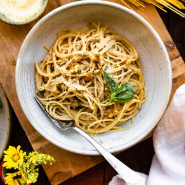 tender spaghetti with vegan pasta sauce in white bowl