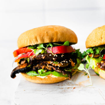 veggie burger with mushroom on white board