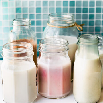Glass bottles of homemade nut milk