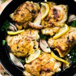 overhead image: herb roasted chicken thighs in skillet