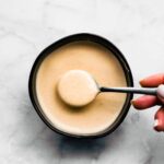 overhead image: Japanese sakura sauce on spoon over bowl of the sauce