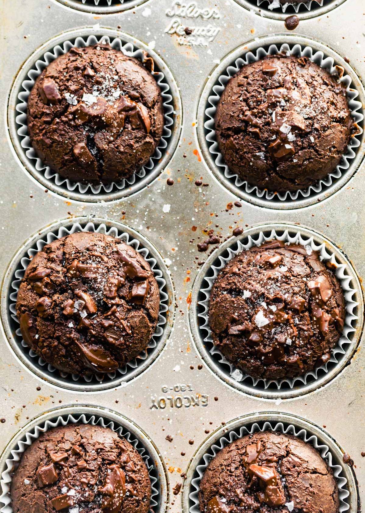 overhead shot of chocolate gluten free muffins baked in muffin pan