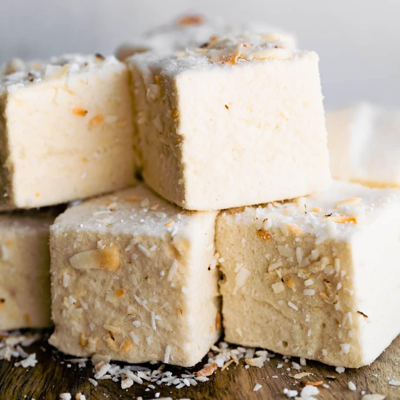 A close-up view of  Homemade Coconut Marshmallows
with toasted coconut topping.