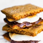 Side view of two oven baked smores on top of each other.