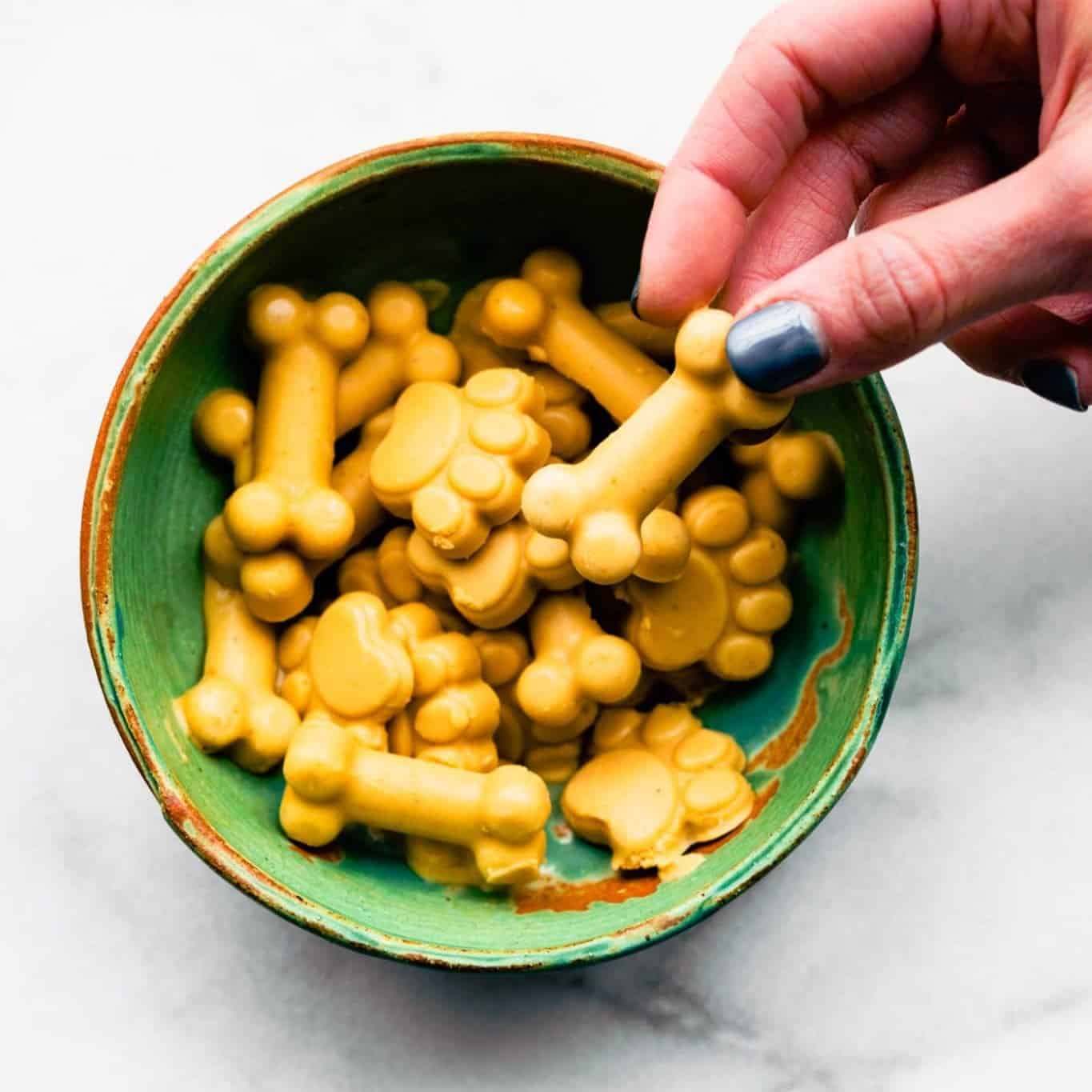 A photo of a bowl of Easy Homemade Frozen Dog Treats
