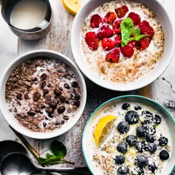3 bowls of n'oatmeal with a raspberry and mint version, a mocha version, and a lemon blueberry version