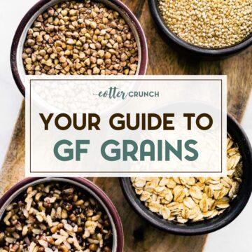 four bowls of gluten free grains on a wooden plank containing buckwheat, millet, gluten free oats, and quinoa