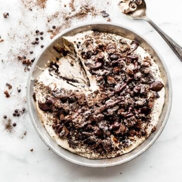 Overhead view gluten free no bake dirt pie in silver pie plate.