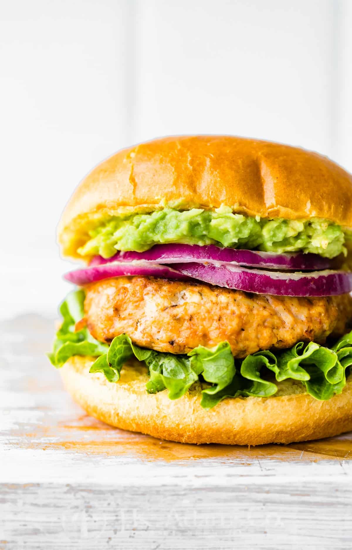 A grilled ground chicken burger.