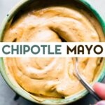 Close up image of chipotle mayonnaise in a bowl with a spoon with a text overlay for pinterest.