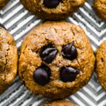 Overhead Close-up of pumpkin chocolate chip cookies on a baking sheet