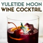 A photo of a Yuletide Moon Red Wine Cocktail with a text overlay for pinterest.