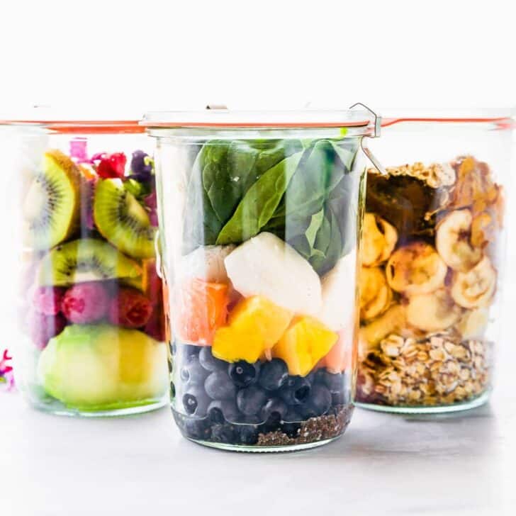 A photo of 3 glass jars of Make-Ahead Protein Smoothie Packs