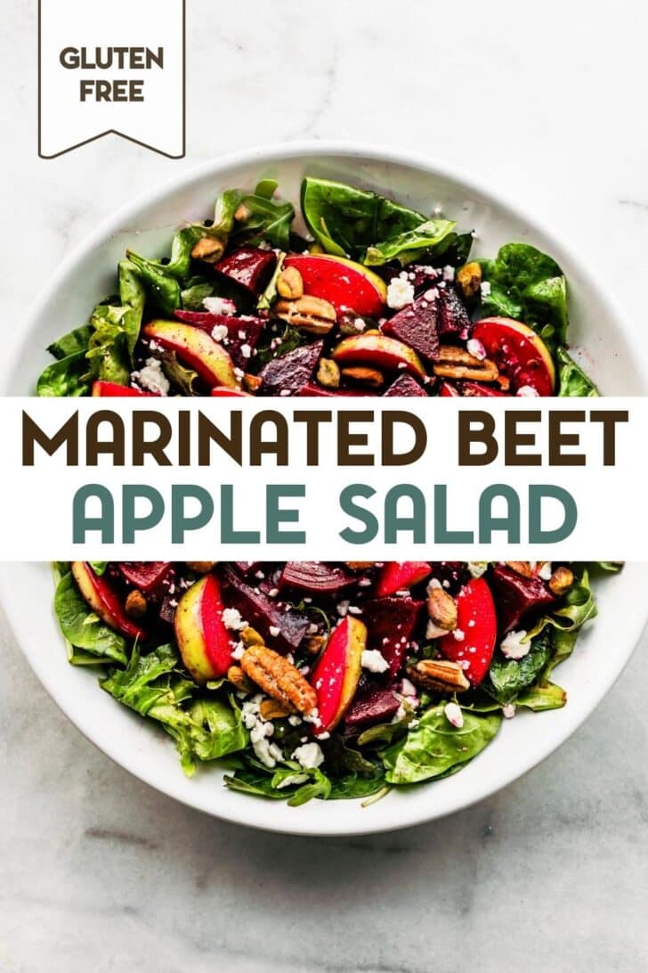 A marinated beet and apple salad in a large white bowl with a text overlay for pinterest.